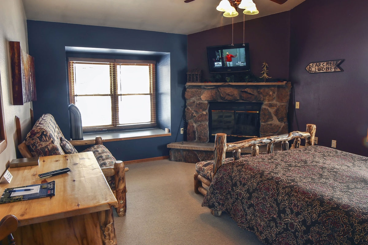 estes park cabin with a fireplace