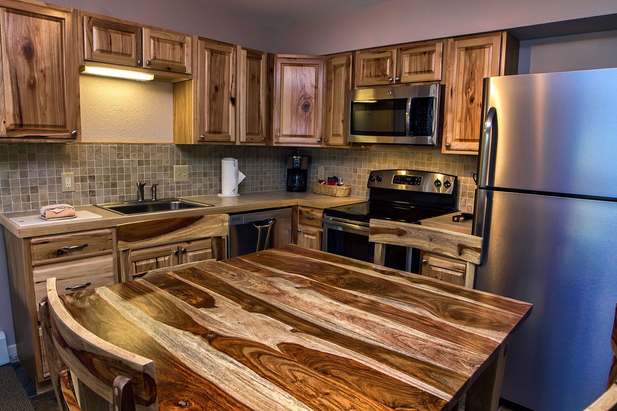 image of estes park cabins with a full kitchen