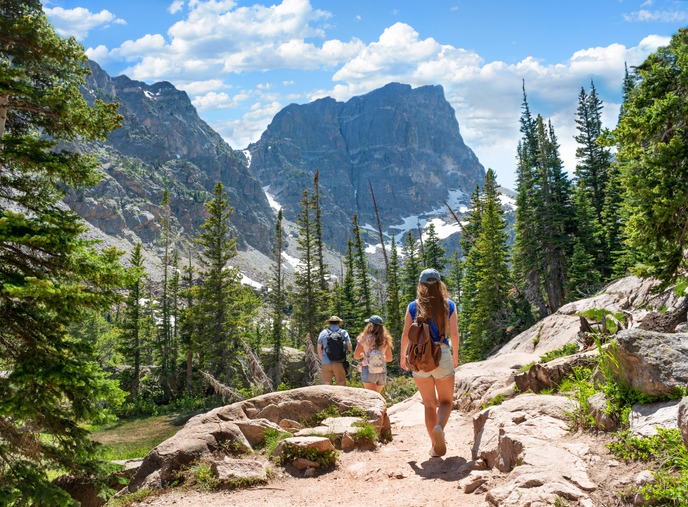 People exploring Colorado mountains.